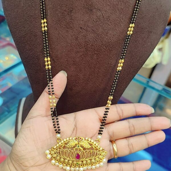 high quality.. Matt finished... Long black beads..