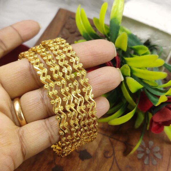 high quality..designer gold finished bangles...
