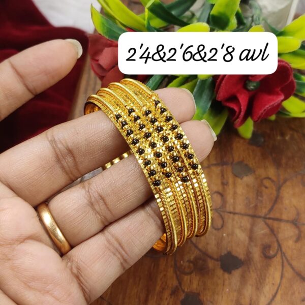high quality.gold finished black bangles