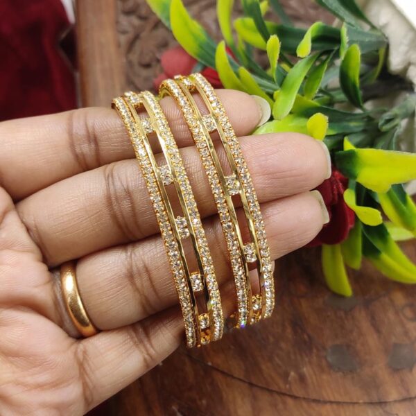 high quality.. gold finished..stones .bangles..