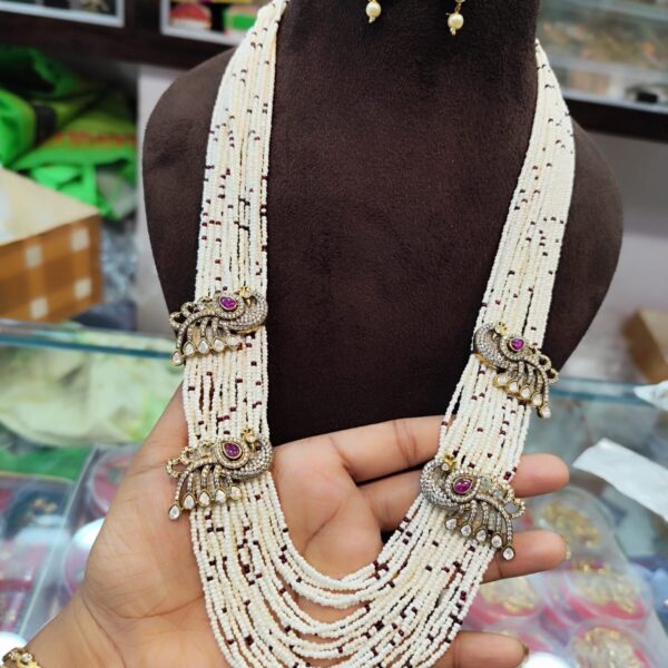 High quality... Mossonaite stones.. Peacock pendent with pearls haram..