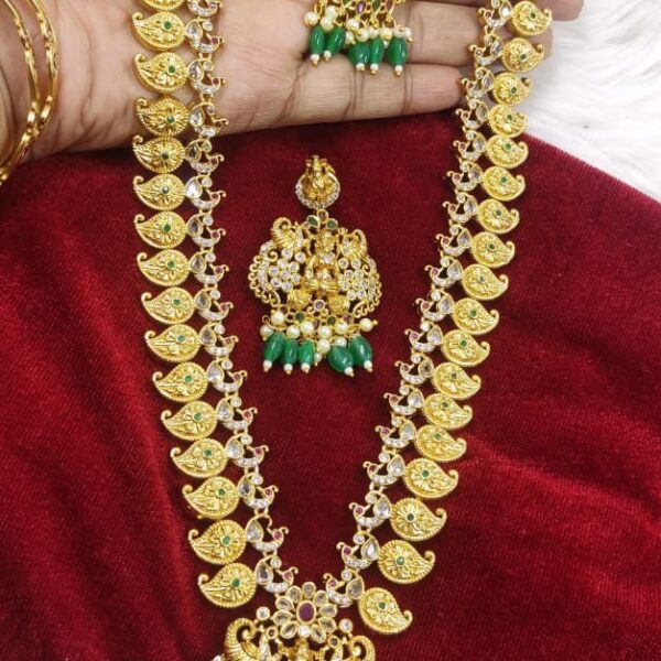 high quality..matt gold finished long haram with mango design ..